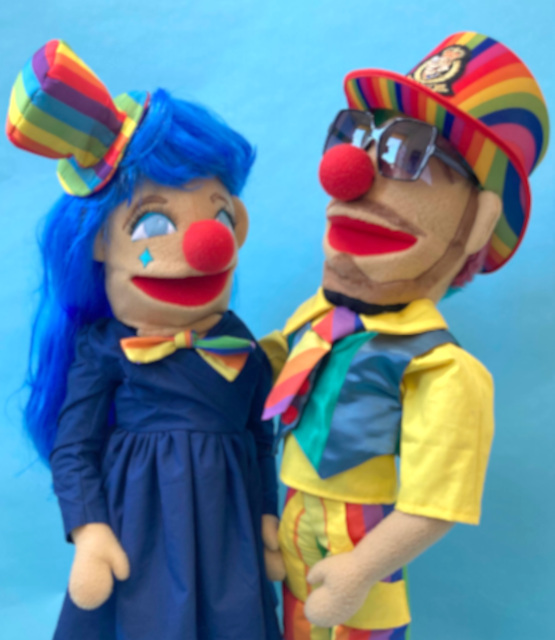 Custom puppets made by Picture to Puppet - 2 clown hand puppets on a blue background
