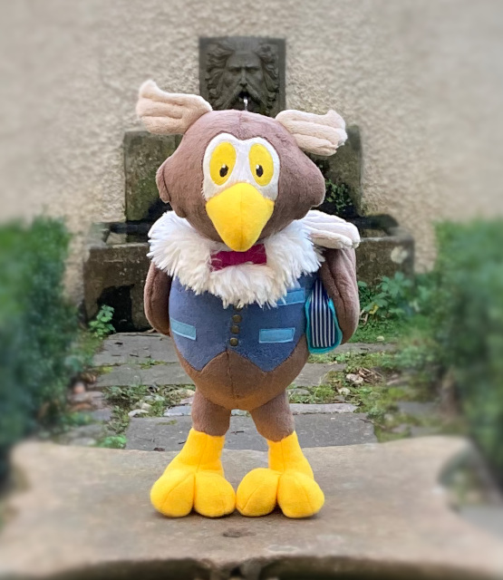 Custom Soft Toys made by Picture to Puppet - A soft toy owl holding a book